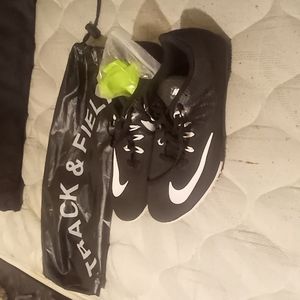 Nike track and field cleats size 8.5 black and white